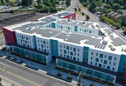 Aerial view of solar panels on top of Las Adelitas in NE Portland.