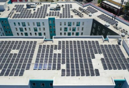Aerial view of solar panels on top of Las Adelitas in NE Portland.
